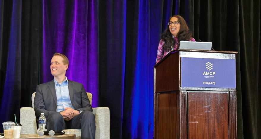 Sneha Sharma, director of specialty clinical solutions, and Michael Szatkowski, product development director of specialty, present at AMCP Nexus 2024.