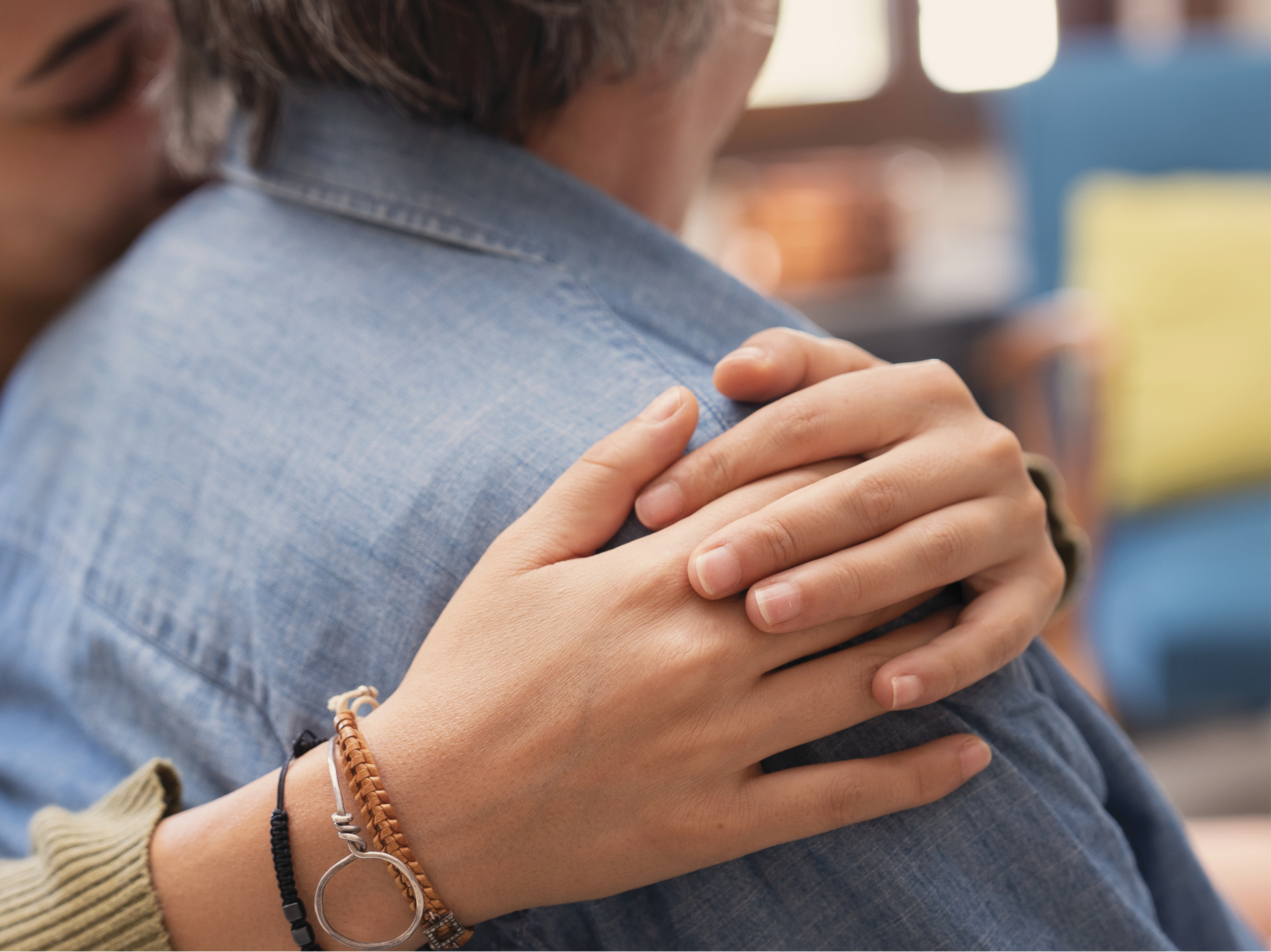 Close up of person pouring prescription pills into hand
