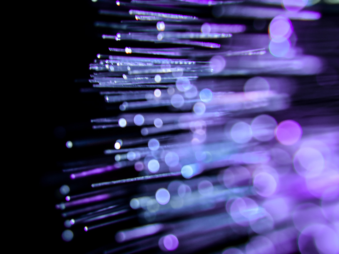 Abstract image of purple lights on a black background